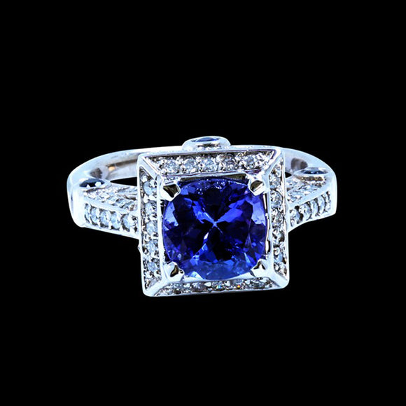 2.31CT NATURAL TANZANITE 14K W/G RING   