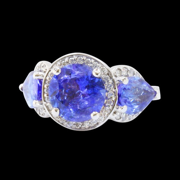 5.6CT NATURAL TANZANITE 14K W/G RING 
