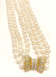 Akoya Japanese pearls with a 14k gold clasp with diamonds 7-7.5mm  18inches