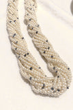 15 strands of biwa pearls with sapphire beads and a 14k yellow gold clasp 18inches about 3mm