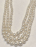 Graduating akoya pearls with a 14k yellow clasp 4-7.5mm 16-18inches